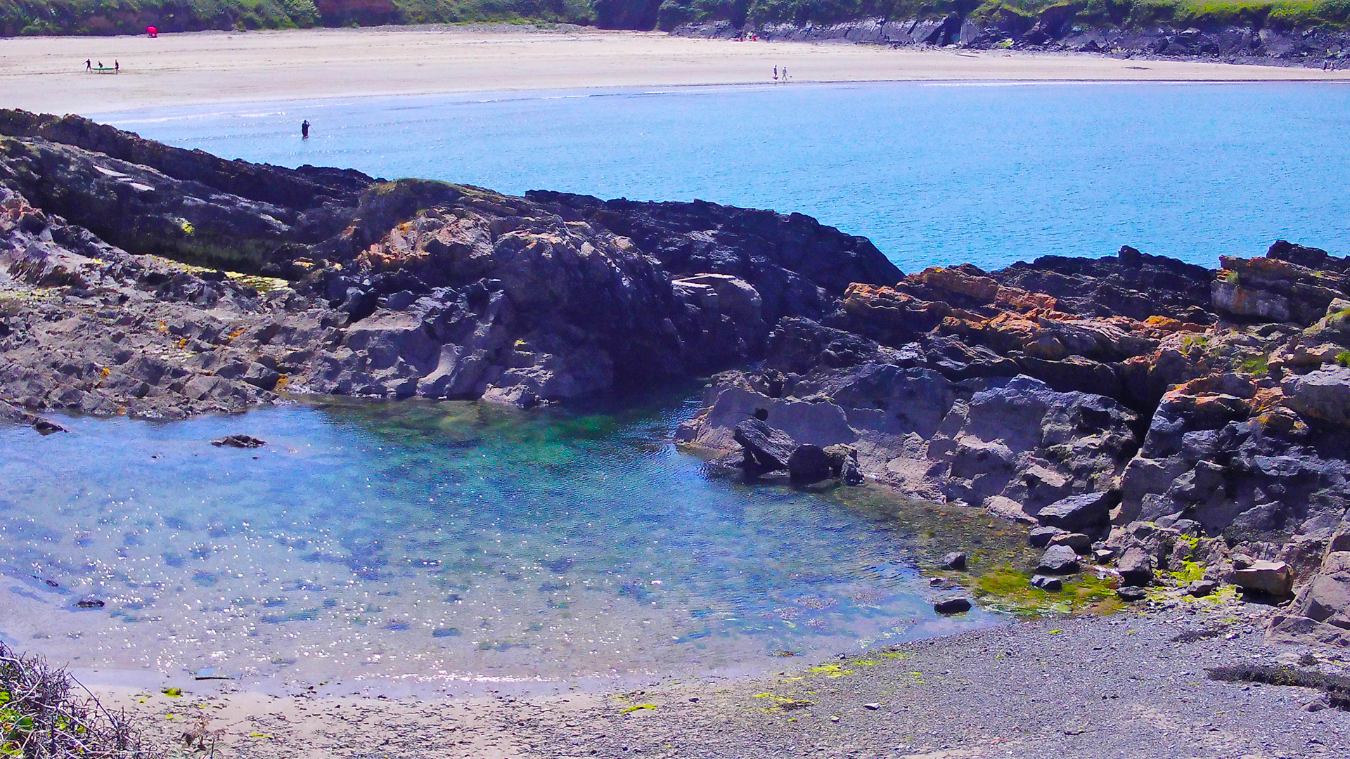 West Bay beach, Pembrokshire, West Wales, shoreline and rock pools